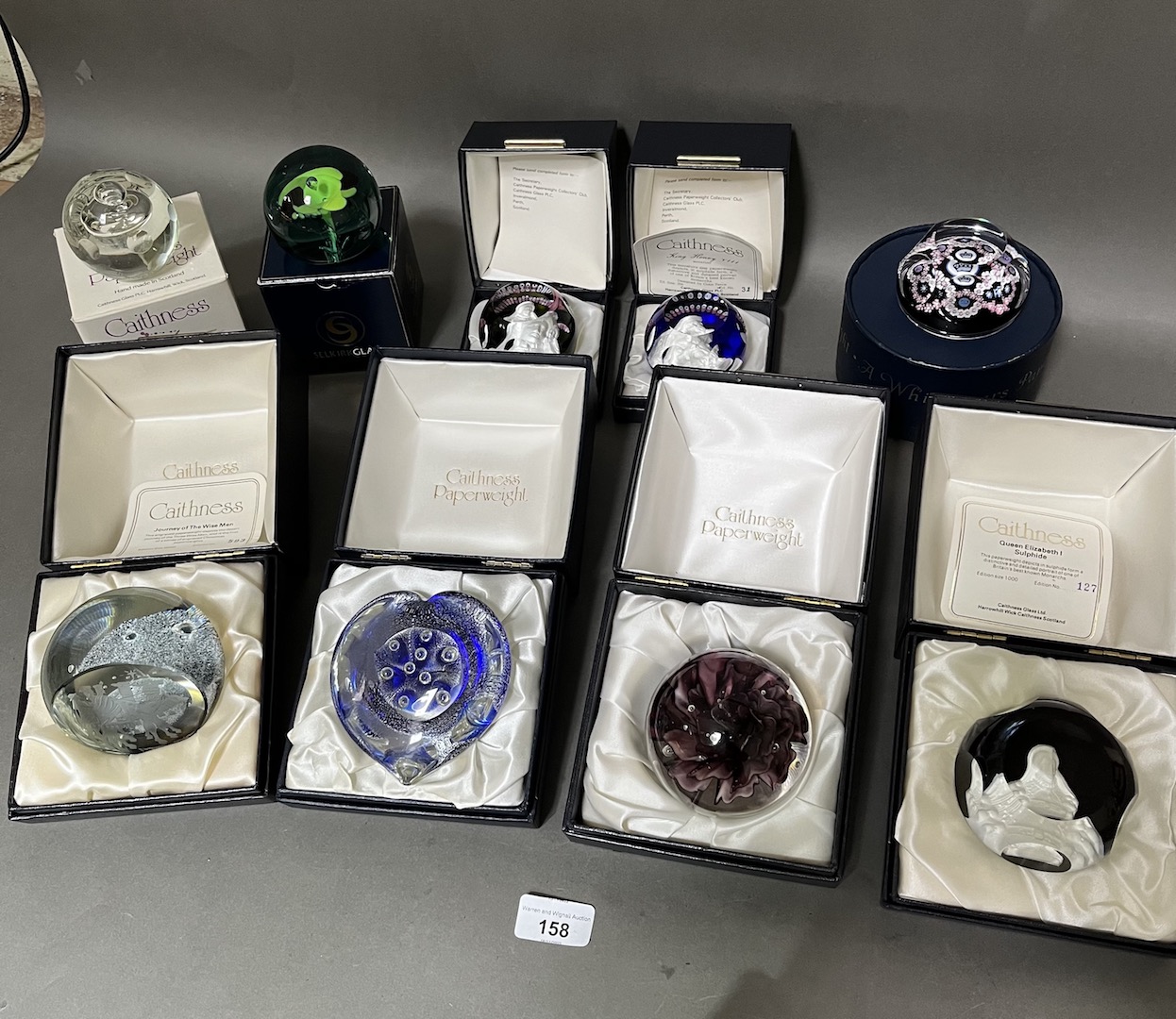 A collection of eight mainly Caithness & one Whitefriars Silver Jubilee paperweights.