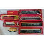 A collection of Hornby railways items to include Shell tank wagons, insulated milk van, 2