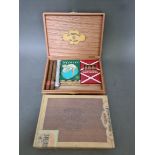 A sealed Meriel DeLuxe cigar box together with a La Tropical De Luxe cigar box containing various