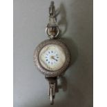 A ladies silver wristwatch, marked 0.935.