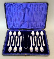 A hallmarked silver cased set of 12 teaspoons and sugar snips, Thomas Latham & Ernest Morton,