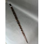 An African carved hardwood walking stick, length 100cm.