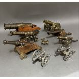 Eight cannons to include brass.