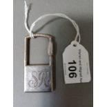 A silver key fob, marked 925.