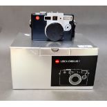 A Leica Digilux 1 digital camera with AC adapter / charger, instructions manual, a USB 2.0 multi-