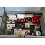 A deed box containing vintage jewellery, cuff-links, tie pins, silver and a Helvetia military