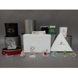 A box of crystal ornaments and accessories to include Swarovski, Hadrian, empty swarovski boxes