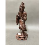 A carved hardwood Japanese figure, 30cm height.