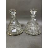 A pair of early 20th century Art Deco cut glass ship's decanters.