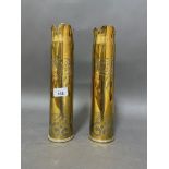 A pair of WW1 trench art brass shells.