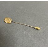 A hallmarked 9ct gold diamond stick pin, wt. 1g.