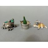 A silver and green enamel frog, marked 925 together with a silver and enamel cat and a silver