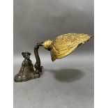 A vintage "Scotsman Tam O Shanter" cast metal adjustable table lamp with gilt brass "sconce" type