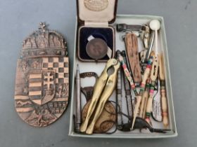 A small box of bric a brac including sports medals, penknives, propelling pencil etc