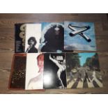 8 assorted LPs including The Doors, Bob Dylan, David Bowie, The Beatles etc.