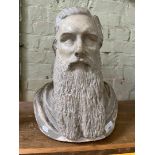 A painted plaster bust of a gentleman.