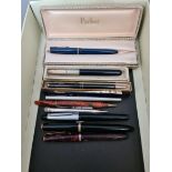A collection of pens, fountain pens to include Parker, 3 with 14ct nibs, a silver plated pen, etc.