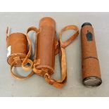 A WW2 snipers scout regiment telescope in leather case, inscribed TEL.SCT.REGT.MK.2.S. K.E.C. O.S.