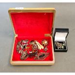 A box of vintage jewellery including silver, marcasite, brooches, Art Deco era, etc.