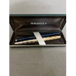A Sheaffer fountain pen with 14ct gold nib and a Parker pen with a Sheaffer associated box.
