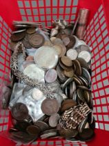 A basket of GB and world coins, with some white metal items.