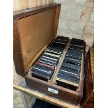 A case containing approx. 200+ early 20th century magic lantern type slides.