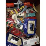 A box of die-cast model toys including Lesney, Burago, Dinky, etc.