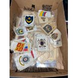 A box of silks, flags and military.