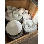 A box with a part dinner service by Thomas, Germany, and a part English bone china tea set