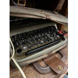 An Olivetti lettera 22 portable typewriter.