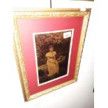 An early 20th century crystoleum depicting a woman, 15cm x 22.5cm, framed.