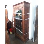 A Continental figured walnut wardrobe with mirrored door. Dimensions- height 216cm, width 104.5cm