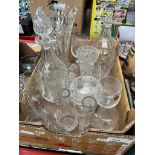 A box of glassware including cut glass decanters, vase, glasses etc.