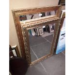 Three gilt framed mirrors and a print after W Heaton Cooper.