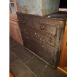 A Victorian stained pine chest of drawers.