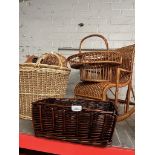 Assorted baskets and a child's rocking chair.