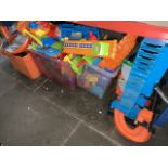 A mixed lot of toys including two boxes of V-Tech Toot Toot Garage, two boxes of Play Mobile and a