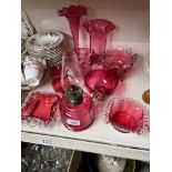9 pieces of cranberry glass