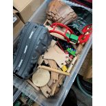 A large box of wooden track, trains and toys + accessories.