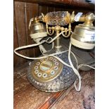 A vintage cut glass telephone.
