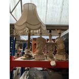 A brass column table lamp and 3 eastern design pottery lamps