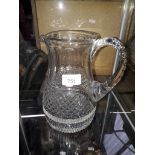 A Georgian cut glass water jug, height 22cm.