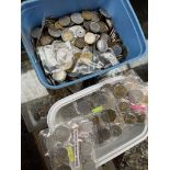 A tub of world coins and a tub of coin sets