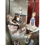 2 Lladro pieces - Girl seated at piano, and girl seated on floor