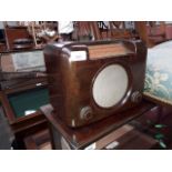 A mid 20th century Bush bakelite radio with valves.