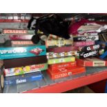 A collection of vintage board games including Scrabble, Cluedo etc.