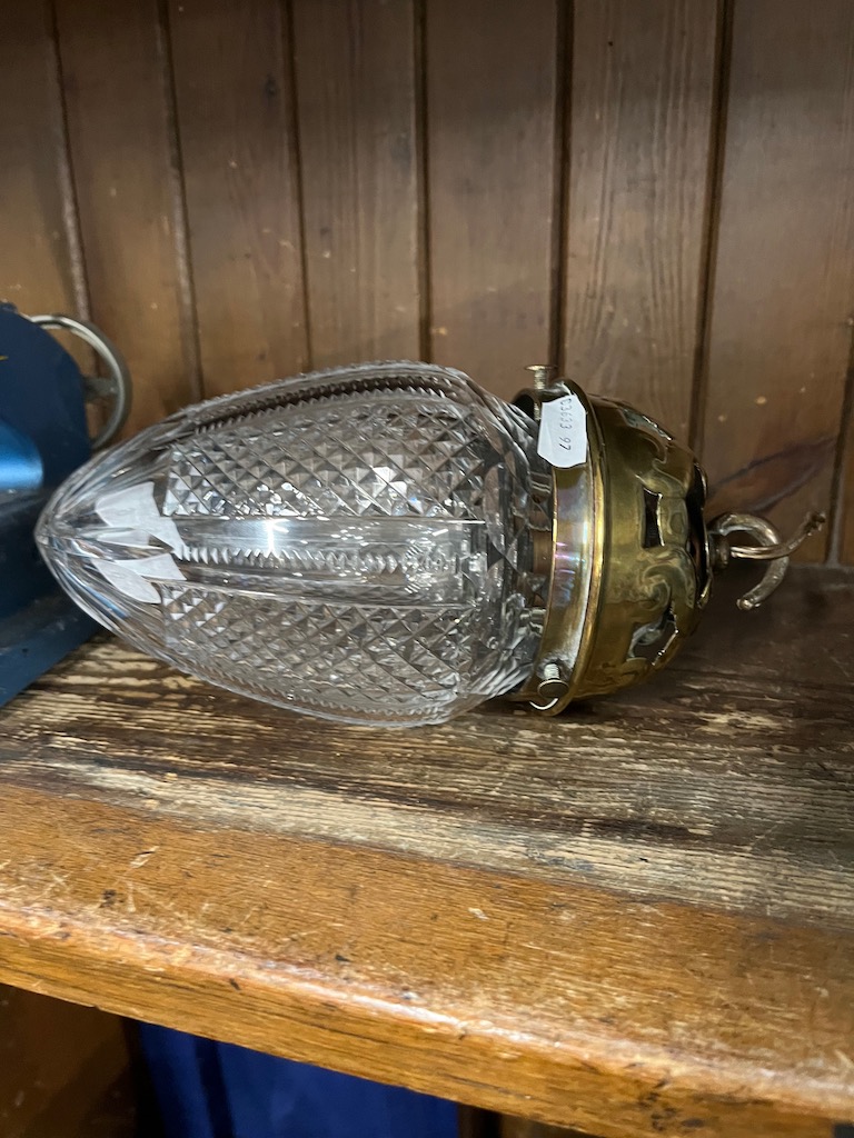 An early 20th century cut glass and brass pendant light fitting.