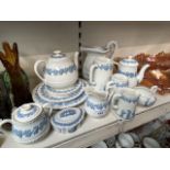 Wedgwood embossed dinner and tea wares - pale blue on cream - 14 pieces, together with large