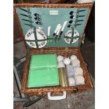 A vintage Hawker Marris Sirram wicker picnic basket complete with cutlery and related items.