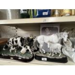3 hand made figures from the Juiliana Collection featuring cows, horses, and horse and cart (as